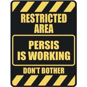   RESTRICTED AREA PERSIS IS WORKING  PARKING SIGN