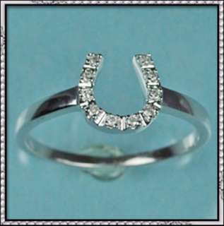 This is a beautiful Horse shoe design 10K 0.05 CT Diamond ring 