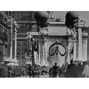  American Troops Marching under Victory Arch Celebrating 
