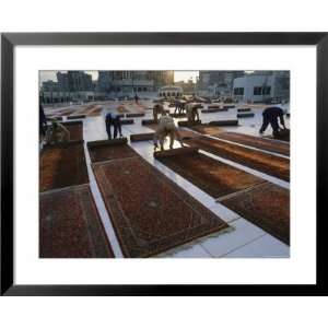  Muslims Unfurl Rugs for Morning Prayers Photography Framed 