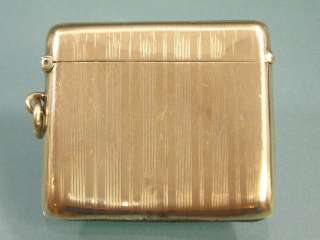 The hallmarks are for 9ct gold, Birmingham, 1911. The maker is HM.