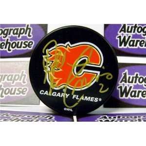  Al MacInnis Autographed/Hand Signed hockey puck (Calgary 