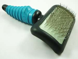   easier for the brush to pass through the hair without damaging coat