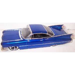   City Diecast 59 Cadillac Coupe De Ville in Color Blue Toys & Games