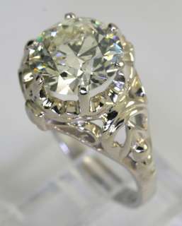   and impressive antique style diamond and 14k white gold ring measuring