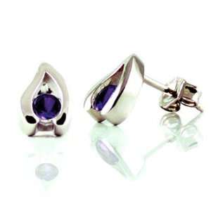   silver holding a radiant purple cubic zirconia David Ashley Jewelry