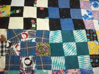 needs to be mended. This great colorful quilt top measures