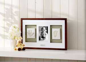 Cute baby picture frame keepsake gift sitting on a shelf