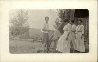 Women w Man Sharpening Stone Wheel Real Photo c1910 Postcard  