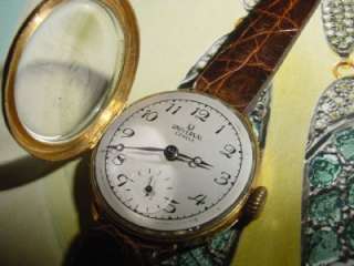 Vintage deco UNIVERSAL GENEVE ladies 18k gold wrist watch c1920  