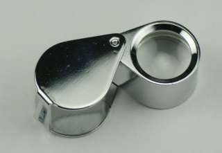 Chrome Folding loupe or eyeglass x10 magnification, 18mm wide lens.