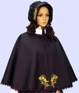 The bonnet is made from the same black fabric as the cape & has the 
