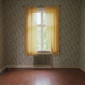  The View of an Old Empty Room with Yellow Curtains, Sweden 