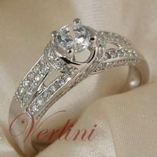   engagement ring with round brilliant cut cubic zirconium diamonds