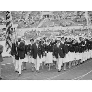 Rafer Johnson Leading USA Athletes During the Opening Day. 1960 