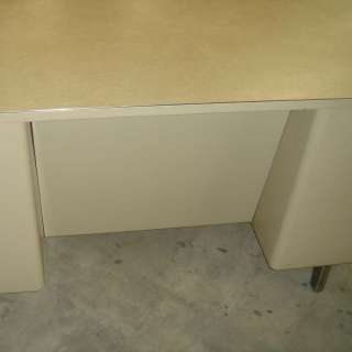   formica top the desk features four drawers on both sides one file