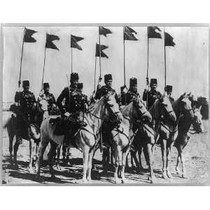  8 members of the Turkish cavalry on horseback w/ flags 
