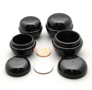 pack of very sturdy thick wall all black plastic cream jars in a 